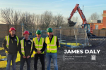 James Daly and Bury College Princpal Charlie Deane standing with the contractors who are assembling the new building at Bury College for the Institute of Technology